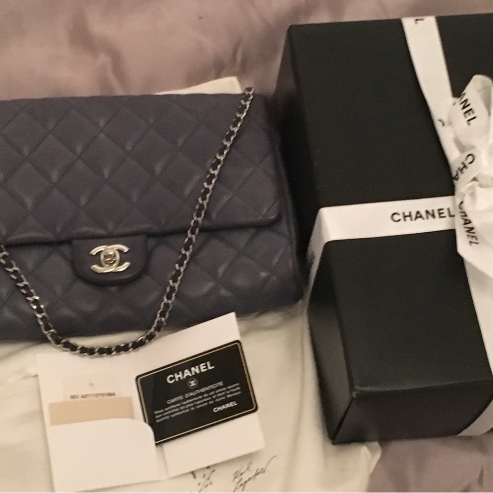 Chanel classic swap Lambskin clutch in denim blue with silver hardware